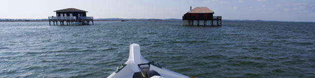 Cabanes Tchanquées Et Bateau