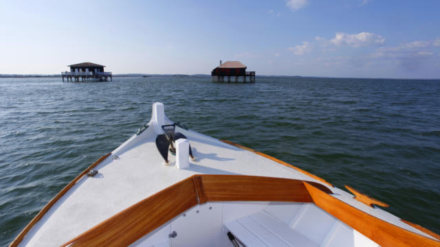 Cabanes Tchanquées Et Bateau