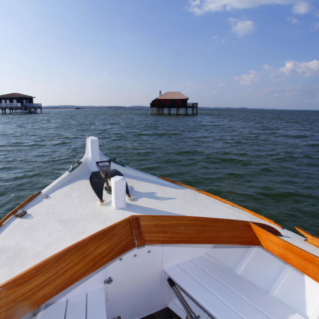 Cabanes Tchanquées Et Bateau