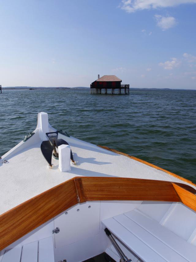 Cabanes Tchanquées Et Bateau